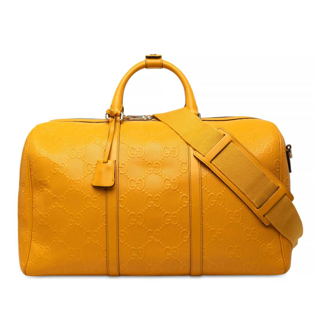 Gucci Sac de voyage GG embossé Duffle Cuir de veau Jaune – vue principale – GABY PARIS