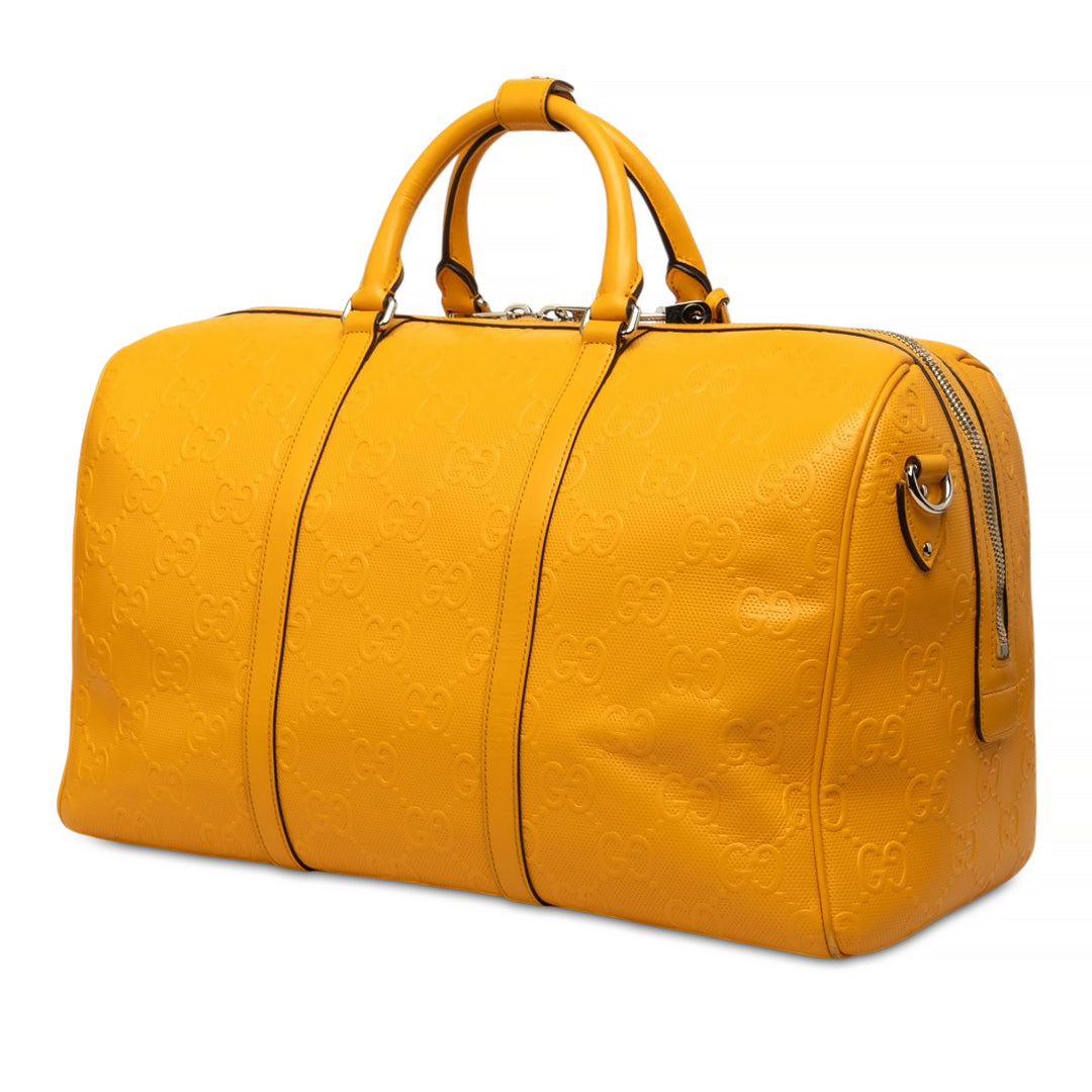 Gucci Sac de voyage GG embossé Duffle Cuir de veau Jaune – vue 2 – GABY PARIS