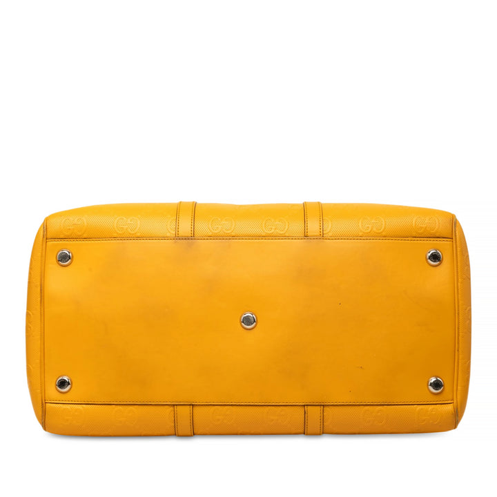 Gucci Sac de voyage GG embossé Duffle Cuir de veau Jaune – vue 3 – GABY PARIS