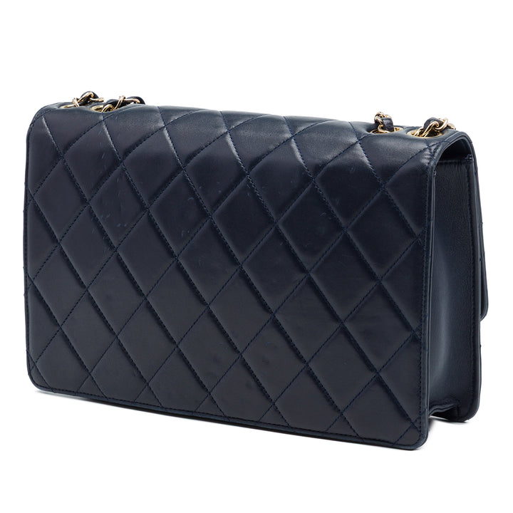 Chanel Matelassé Cuir d’agneau Golden Class à rabat