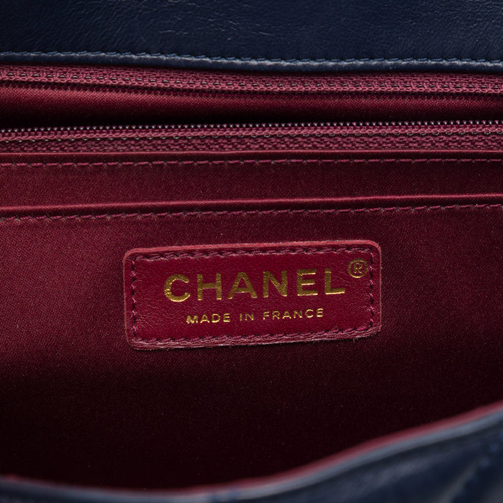 Chanel Matelassé Cuir d’agneau Golden Class à rabat