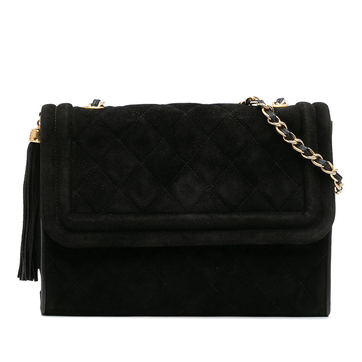 Chanel Quilted Daim Tassel Flap Noir – GABY PARIS Authentique