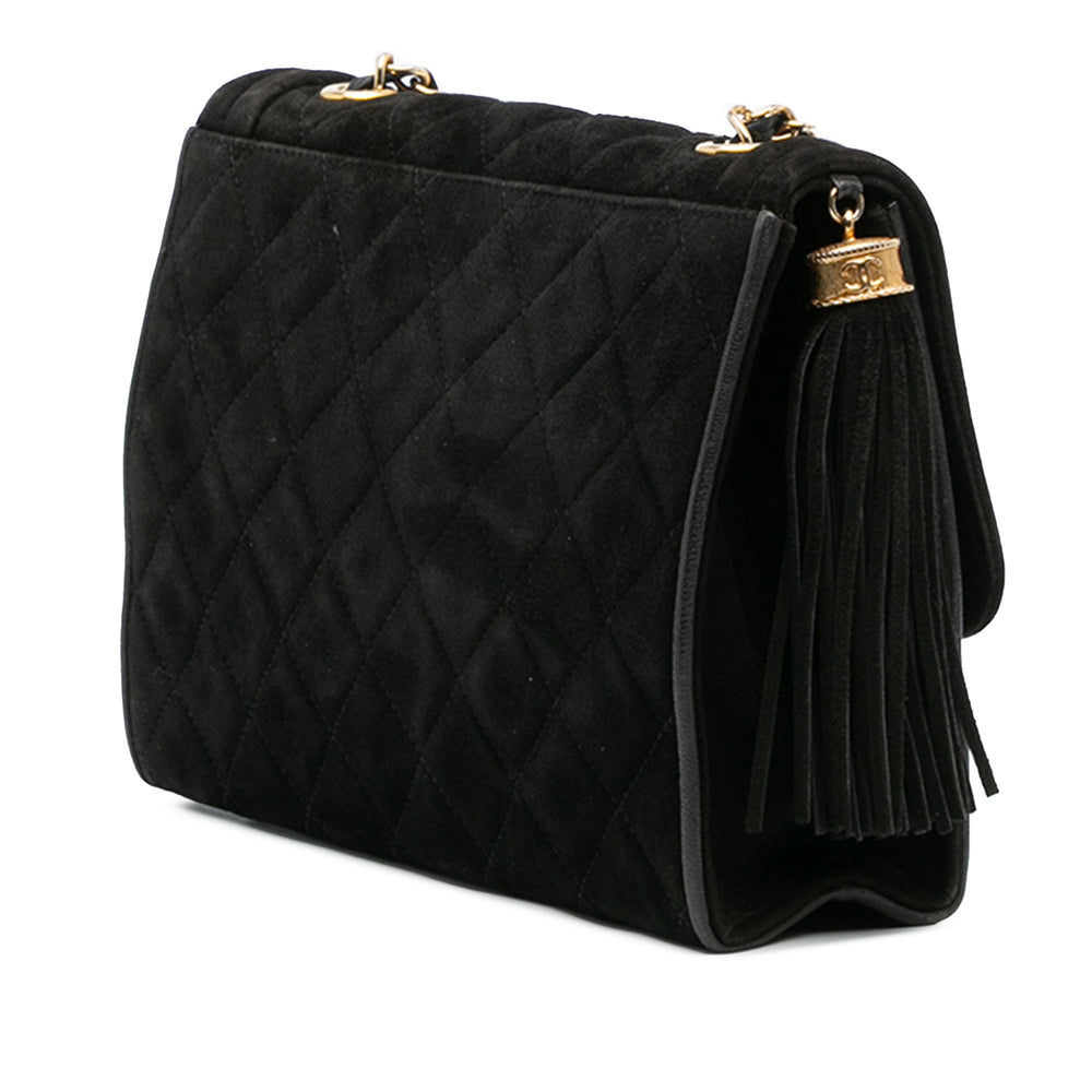 Chanel Quilted Daim Tassel Flap Noir – GABY PARIS Authentique