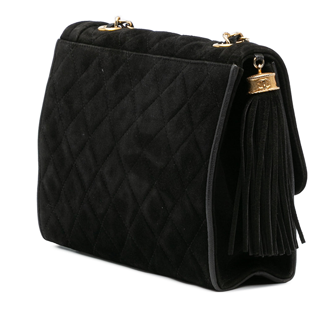 Chanel Quilted Daim Tassel Flap Noir – GABY PARIS Authentique