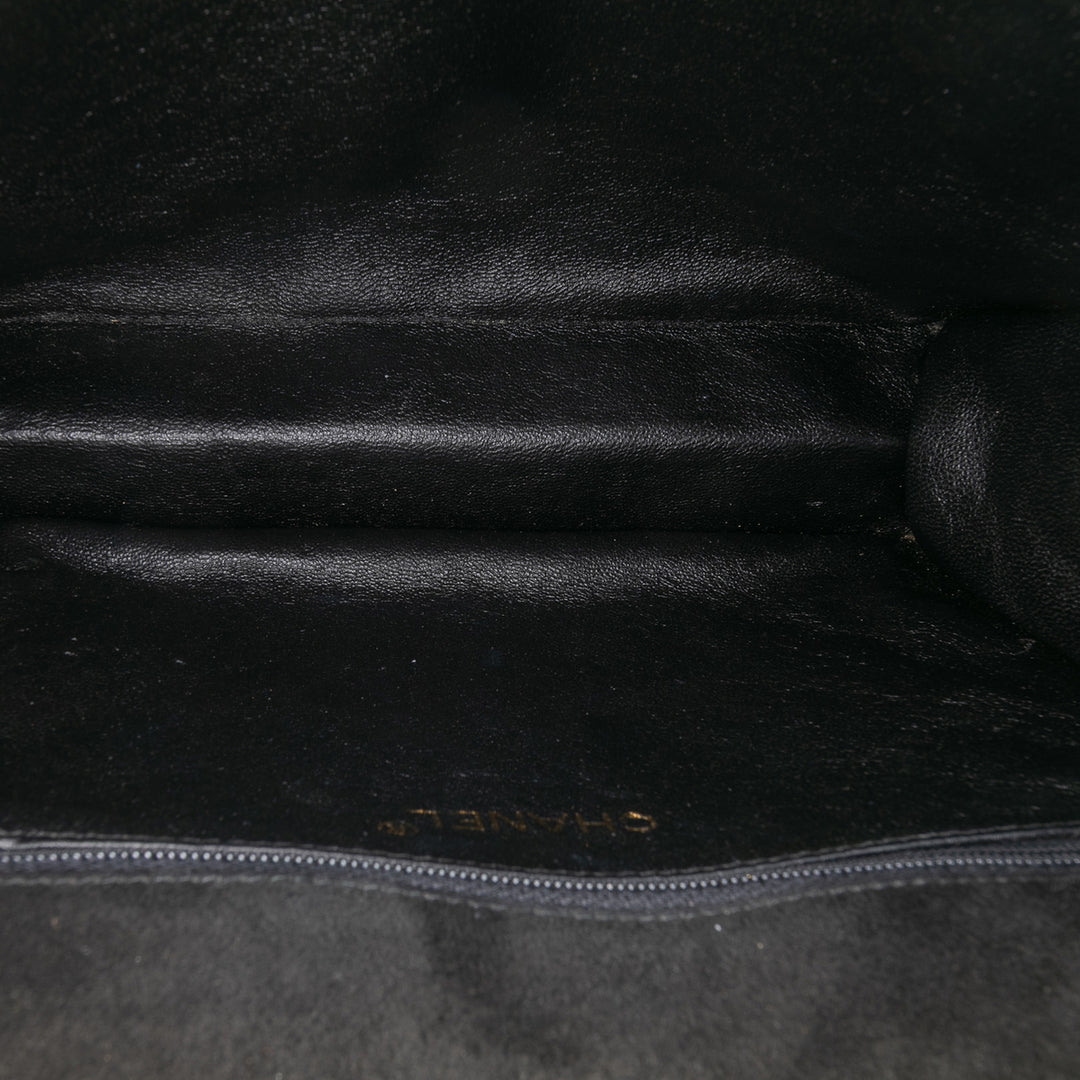 Chanel Quilted Daim Tassel Flap Noir – GABY PARIS Authentique