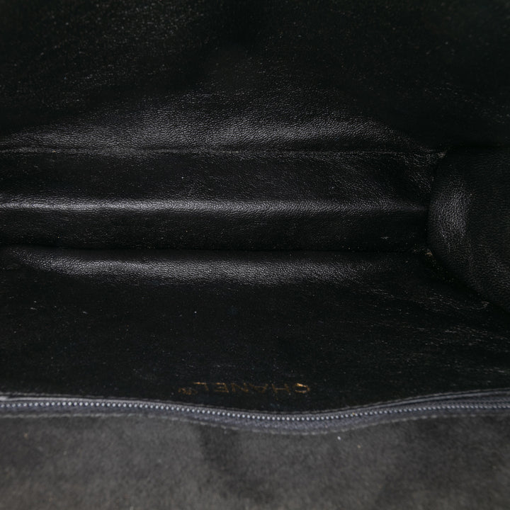 Chanel Quilted Daim Tassel Flap Noir – GABY PARIS Authentique