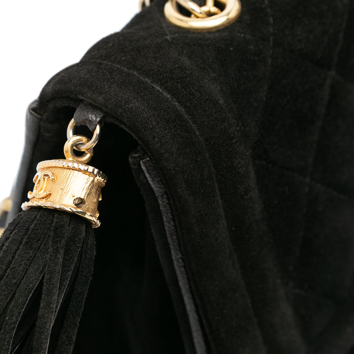 Chanel Quilted Daim Tassel Flap Noir – GABY PARIS Authentique