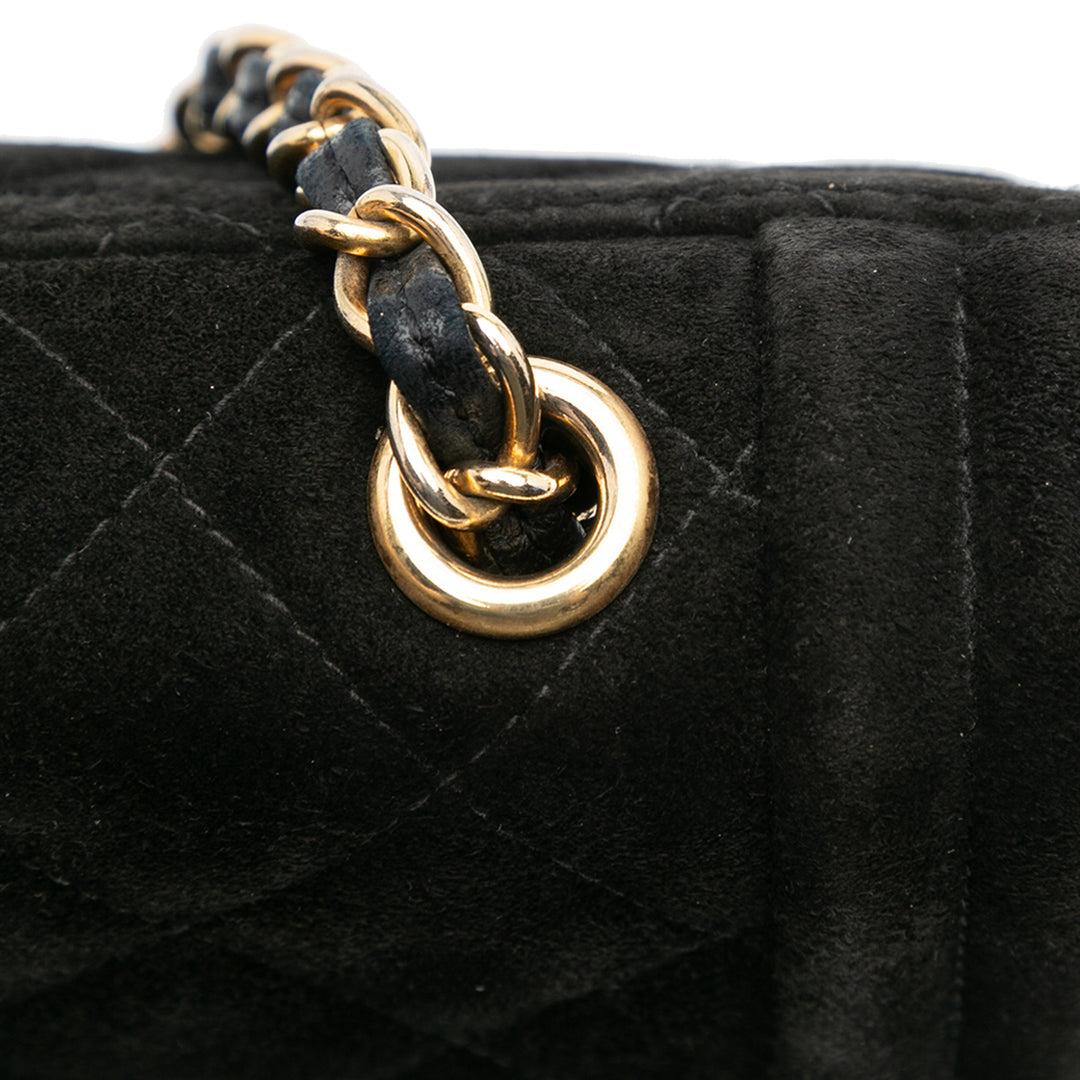 Chanel Quilted Daim Tassel Flap Noir – GABY PARIS Authentique