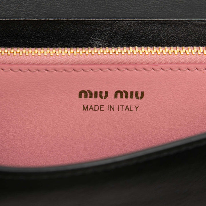 Miu Miu Soft Veau Bow Bifold Portefeuille long