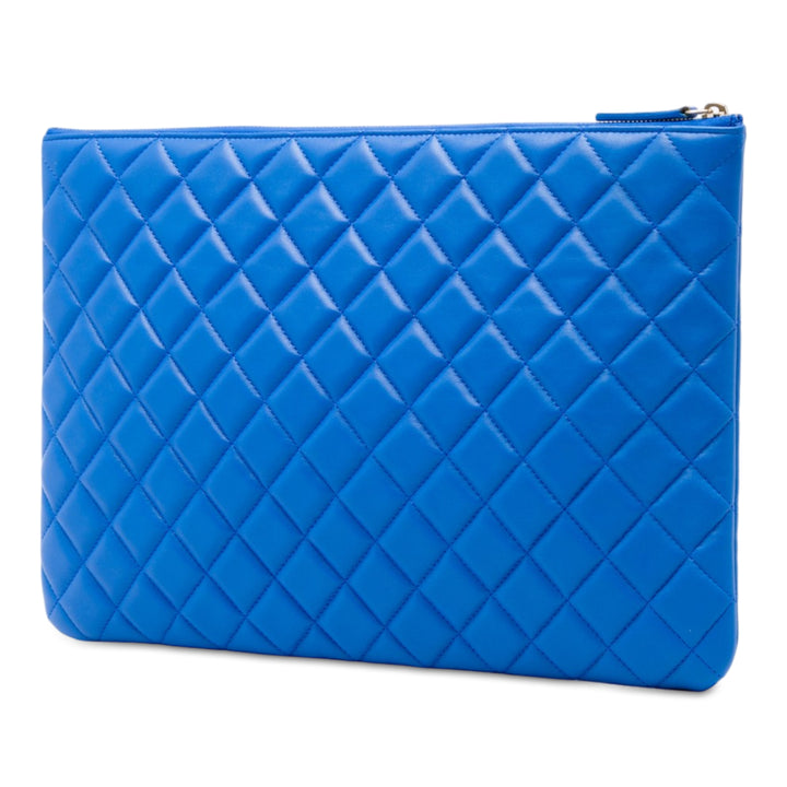 Matelassé O Étui Pochette Grand Cuir d'agneau Bleu