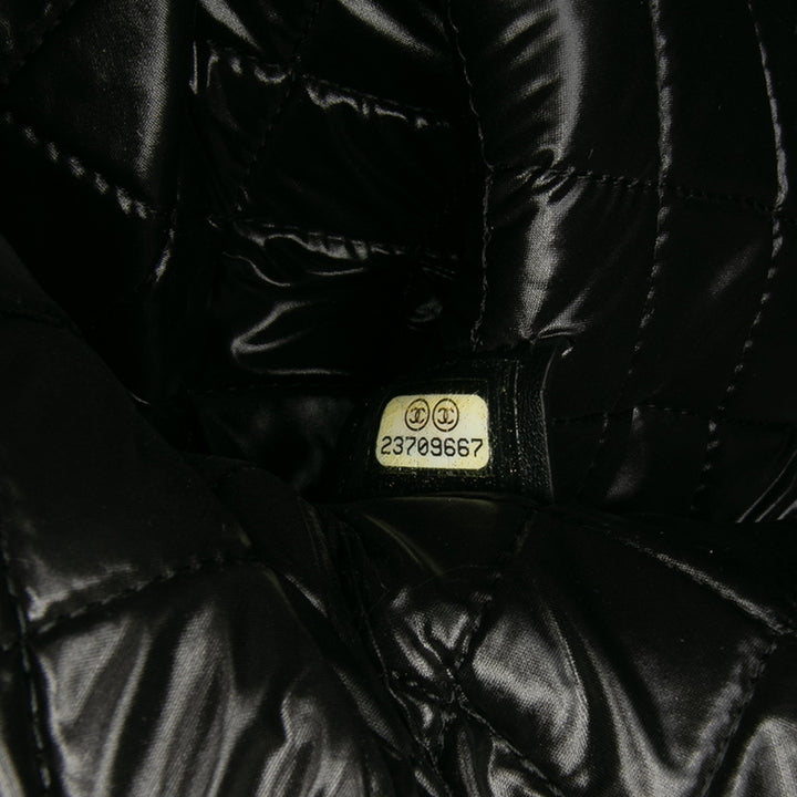 Large Quilted Lambskin Camellia O Case Clutch Black - Gaby Paris