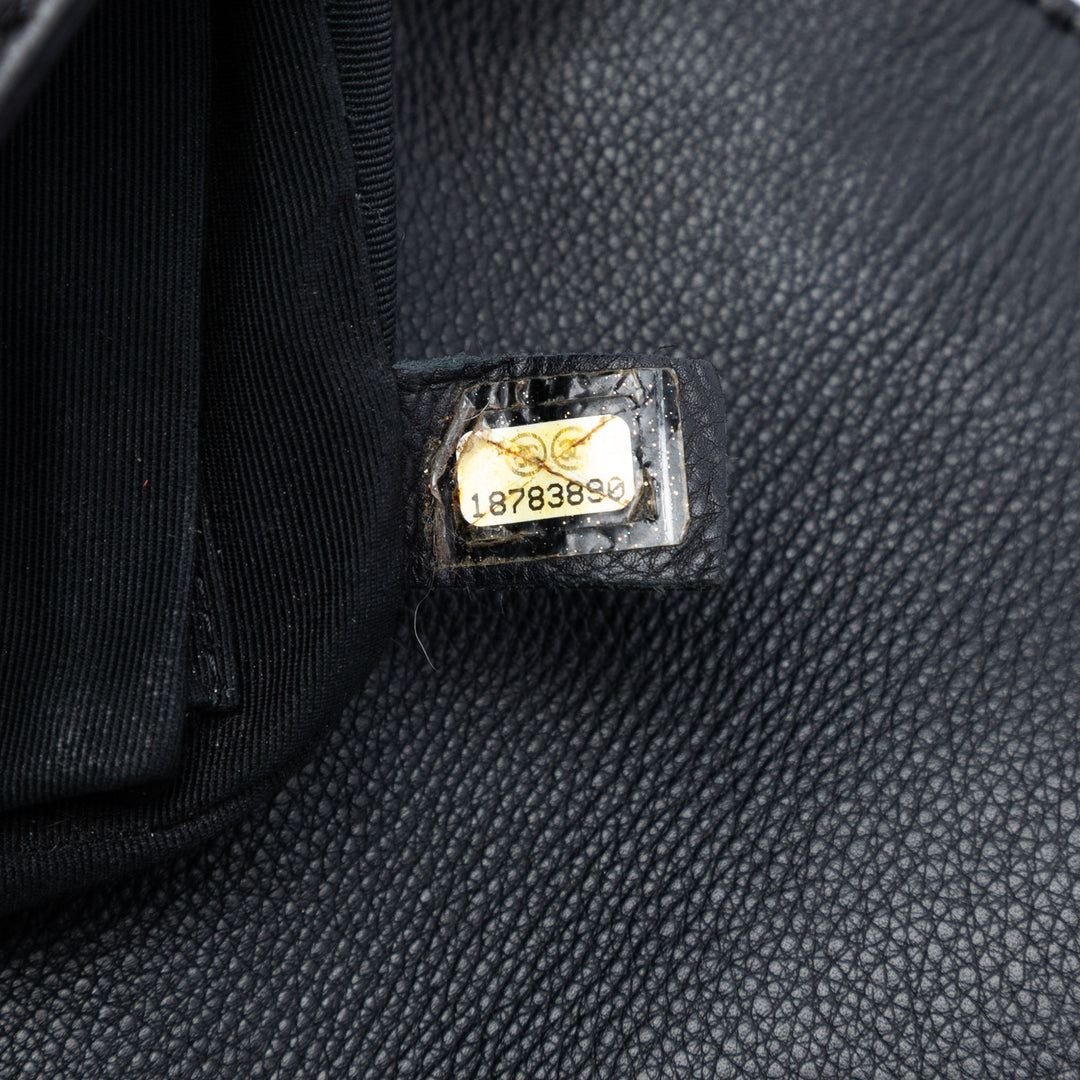 Chanel Boy Reverso à rabat Moyen Cuir de veau