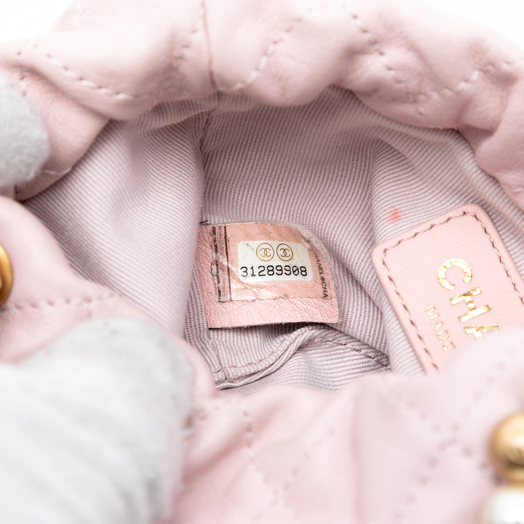 Chanel Mini Matelassé Cuir de veau About Perles Drawstring Bucket Bag