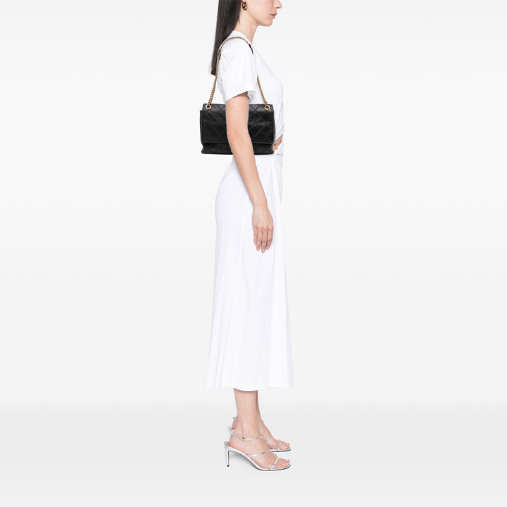 Chanel Large Reissue 2.55 Diamond Debossed Cuir de veau Cosmos Flap Noir – GABY PARIS Authentique