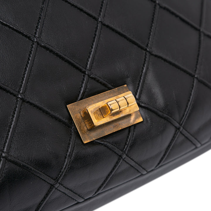 Chanel Large Reissue 2.55 Diamond Debossed Cuir de veau Cosmos Flap Noir – GABY PARIS Authentique