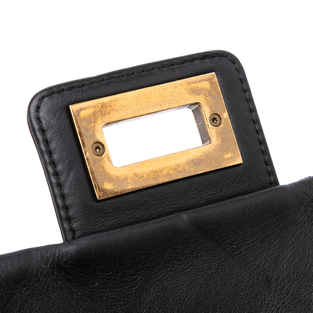 Chanel Large Reissue 2.55 Diamond Debossed Cuir de veau Cosmos Flap Noir – GABY PARIS Authentique