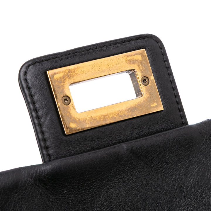 Chanel Large Reissue 2.55 Diamond Debossed Cuir de veau Cosmos Flap Noir – GABY PARIS Authentique
