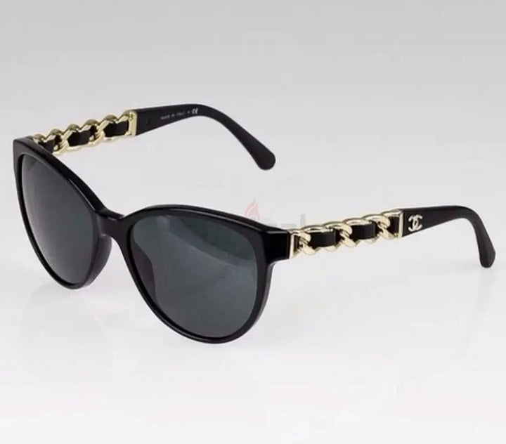 Chanel Lunettes de soleil Butterfly chaîne et cuir noir